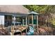 Community playground with slide and covered area for entertainment at 949 Tumlin Trce, Lawrenceville, GA 30045