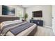Modern bedroom with a large bed, stylish furniture, and plenty of natural light at 1777 Meadow Sw Ln, Atlanta, GA 30315