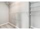 Walk-in closet with wire shelving and carpet floors at 1777 Meadow Sw Ln, Atlanta, GA 30315