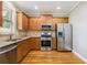 Updated kitchen featuring stainless steel appliances and ample cabinet space at 1777 Meadow Sw Ln, Atlanta, GA 30315