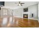 Spacious living room featuring a fireplace and hardwood floors at 1777 Meadow Sw Ln, Atlanta, GA 30315