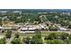 Panoramic aerial view of a town with historic buildings and lush greenery at 2995 Ivy Mill Dr, Buford, GA 30519