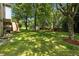 Backyard with mature trees and plenty of room at 2995 Ivy Mill Dr, Buford, GA 30519