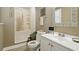 Bright bathroom featuring a vanity, toilet, and shower/tub combination at 2995 Ivy Mill Dr, Buford, GA 30519
