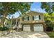 Lovely home showcasing a spacious porch and a two-car garage at 2995 Ivy Mill Dr, Buford, GA 30519