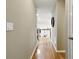 Hallway leading to the second floor, with hardwood floors and neutral paint at 2995 Ivy Mill Dr, Buford, GA 30519