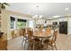 Eat-in kitchen with a bay window, and wooden dining set at 2995 Ivy Mill Dr, Buford, GA 30519