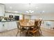 Eat-in kitchen with white cabinets and stainless steel appliances at 2995 Ivy Mill Dr, Buford, GA 30519
