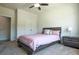 Comfortable bedroom with a double bed, soft carpet, and ample closet space at 3222 Long Creek Dr, Buford, GA 30519