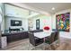 Spacious living room with sleek leather sectional, high ceilings, and modern decor at 3222 Long Creek Dr, Buford, GA 30519
