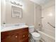 This bathroom features a vanity with a sink, a shower and bathtub combination, and neutral fixtures at 3405 Leisure Ln, Atlanta, GA 30349