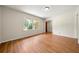 Bright room with wood floors and natural light, offering a serene atmosphere at 3405 Leisure Ln, Atlanta, GA 30349