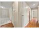 This hallway features hardwood floors and neutral walls at 3405 Leisure Ln, Atlanta, GA 30349