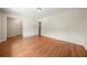 Spacious living room featuring wood floors and neutral walls, ready for personalization at 3405 Leisure Ln, Atlanta, GA 30349
