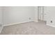 Neutral bedroom with mirrored closet doors and carpeted floors at 3451 Carriage Chase Rd, Atlanta, GA 30349