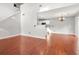 Hardwood floors on the main floor, with a view to the kitchen and breakfast area at 3451 Carriage Chase Rd, Atlanta, GA 30349