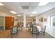 Brightly lit dining area with multiple tables and chairs, perfect for gathering and socializing at 1800 Clairmont Lk # 427, Decatur, GA 30033