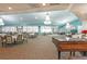 A spacious event hall featuring chandeliers, tables, chairs, and views at 1800 Clairmont Lk # 427, Decatur, GA 30033