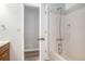 Bathroom with tub, toilet, and partial view of sink at 2780 Highpoint Rd, Snellville, GA 30078