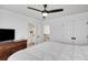 Bedroom with ceiling fan, carpet and view to ensuite bathroom at 4715 Mcintosh Drive Dr, Cumming, GA 30040