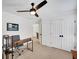 Bedroom with ceiling fan, neutral carpet, a desk and double door closet at 4715 Mcintosh Drive Dr, Cumming, GA 30040