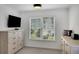 This comfortable bedroom provides a ceiling fan and two dressers for storage at 4715 Mcintosh Drive Dr, Cumming, GA 30040