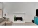 Bright and airy living room features a cozy fireplace and comfortable seating at 4715 Mcintosh Drive Dr, Cumming, GA 30040