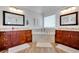 Spacious bathroom featuring double vanities, soaking tub, and tile floors at 4715 Mcintosh Drive Dr, Cumming, GA 30040
