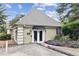 Community fitness center featuring a well-maintained exterior, double doors, and lush landscaping at 2657 Lenox Ne Rd # 134-2, Atlanta, GA 30324