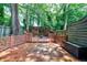 Spacious backyard deck and gazebo offers an inviting outdoor area for relaxing and entertaining at 1002 Creatwood Se Cir, Smyrna, GA 30080