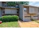 Charming townhouse with two-car garage and well-maintained landscaping at 1002 Creatwood Se Cir, Smyrna, GA 30080