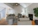 Stylish living room with neutral tones, hardwood floors, and a cozy fireplace feature at 1002 Creatwood Se Cir, Smyrna, GA 30080