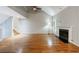 Spacious living room with hardwood floors, fireplace, and vaulted ceilings at 1002 Creatwood Se Cir, Smyrna, GA 30080