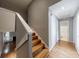 Staircase leading to the second floor with views of living area and bathroom at 1002 Creatwood Se Cir, Smyrna, GA 30080