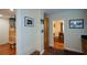 Hallway view into Kitchen and Dinning Room, showing seamless home design with hardwood floor at 1245 Briar Hills Ne Dr, Atlanta, GA 30306