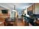 Spacious kitchen with granite countertops, wood cabinetry, and an island for food preparation at 1245 Briar Hills Ne Dr, Atlanta, GA 30306