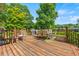 A back deck with a grill and outdoor seating at 1809 Claron Ave, Conley, GA 30288
