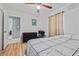 Bedroom featuring wood-look flooring, curtains, and an overhead fan at 1809 Claron Ave, Conley, GA 30288