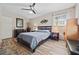 Inviting bedroom with wood flooring, cozy bed, and ample natural light at 1809 Claron Ave, Conley, GA 30288