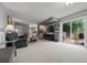 Open concept living room flows to outdoor deck with great natural light at 1809 Claron Ave, Conley, GA 30288