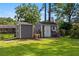 Backyard storage sheds near a grassy lawn at 1809 Claron Ave, Conley, GA 30288