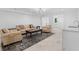 Inviting living room with neutral decor, decorative rug, and comfortable seating for relaxing and entertaining at 819 Loridans Dr, Atlanta, GA 30342