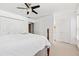 Bedroom showcasing a ceiling fan and closet with white doors at 2556 Oakwood Se Trce, Smyrna, GA 30080