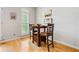 Cozy breakfast nook with natural light from a window and seating for casual dining by the kitchen at 2556 Oakwood Se Trce, Smyrna, GA 30080