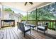 Relaxing outdoor deck featuring comfortable seating and a ceiling fan at 2556 Oakwood Se Trce, Smyrna, GA 30080