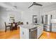 Open-concept kitchen with island seating, stainless steel appliances, and a breakfast nook for casual dining at 2556 Oakwood Se Trce, Smyrna, GA 30080