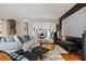 Bright living room with hardwood floors, modern furniture, and an open layout for comfortable living and entertaining at 2556 Oakwood Se Trce, Smyrna, GA 30080