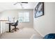 Modern home office featuring a desk, ergonomic chair, and ample natural light at 2556 Oakwood Se Trce, Smyrna, GA 30080