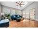 Inviting sunroom with skylights, ceiling fan, hardwood floors, and large windows offering lots of natural light at 2556 Oakwood Se Trce, Smyrna, GA 30080
