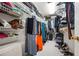 Functional walk-in closet with wire shelving and hanging rods, providing ample storage space for clothes and accessories at 2556 Oakwood Se Trce, Smyrna, GA 30080